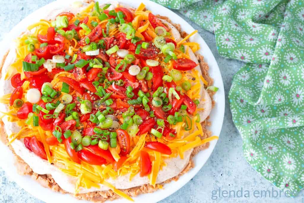 Taco dip on a white plate