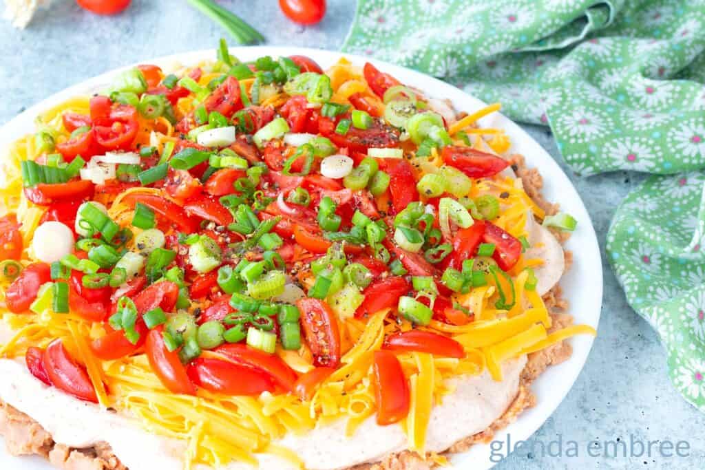 Taco dip on a white plate
